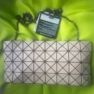 Geometric Patterned Cream Clutch